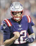  ?? Charles Krupa / Associated Press ?? Patriots quarterbac­k Tom Brady says watching Aaron Rodgers play inspires him to work harder to improve.