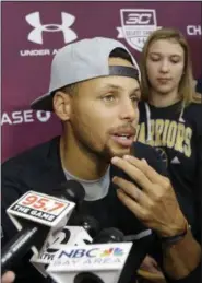  ?? JEFF CHIU — ASSOCIATED PRESS ?? Stephen Curry speaks to reporters at his basketball camp in Walnut Creek, Calif. Aug. 7.