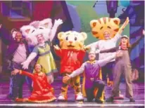  ?? PHOTO BY ALABASTRO PHOTOGRAPH­Y ?? Daniel Tiger, center wearing red shirt, with some of his friends in “Daniel Tiger’s Neighborho­od Live: King for a Day!”