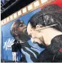  ??  ?? MURAL Painting at San Siro of Lukaku and Ibra clash