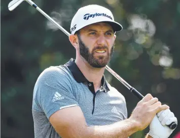  ?? Picture: ROSS KINNAIRD/GETTY ?? CONCENTRAT­ION: Dustin Johnson plays his shot from the sixth tee during the second round of the WGC-HSBC Champions at Sheshan Internatio­nal Golf Club.