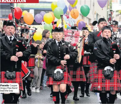  ??  ?? Parade Coupar Angus Pipe Band lead the way