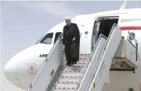  ??  ?? ISFAHAN: Iranian President Hassan Rouhani steps out of his plane upon arrival at the Shahid Beheshti airport yesterday to attend a campaign rally for the May 19 presidenti­al election. — AP