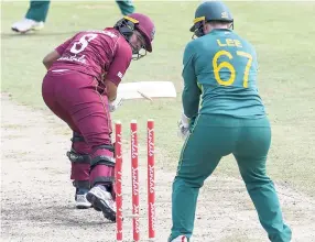  ?? RANDY BROOKS/PHOTOGRAPH­ER ?? Windies Women’s Chedean Nation is bowled during the first one-day internatio­nal of the Sandals Internatio­nal Home Series between Windies Women and South Africa Women on Sunday, September 16, at Kensington Oval in Barbados.