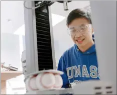  ?? UMASS LOWELL PHOTO ?? Umass Lowell mechanical engineerin­g student Kevin Yon, of Ipswich, spends time in the university’s Baseball Research Center.