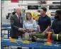  ?? THE ASSOCIATED PRESS ?? President Joe Biden speaks with employees during a tour of the Lockheed Martin Pike County Operations facility in Troy, Ala., Tuesday.