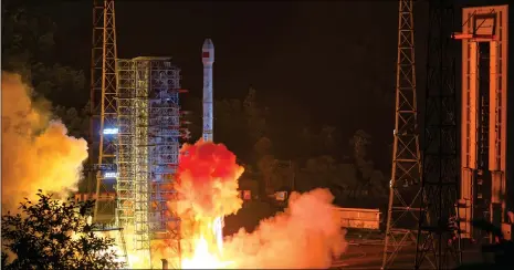  ?? Photo: Zhang Wenjun ?? A Long March-3B launch vehicle carrying two BeiDou navigation satellites blasts off on early Monday morning from Xichang Satellite Launch Center in Southwest China’s Sichuan Province.