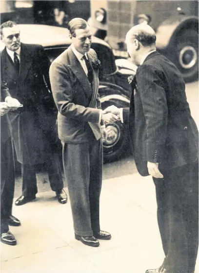  ??  ?? The Duke of Kent in 1938 with Freddie standing behind