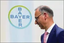  ?? KRISZTIAN BOCSI / BLOOMBERG ?? Bayer CEO Werner Baumann arrives for the company’s annual general meeting in Bonn, Germany, May 25. Baumann said he has “no regrets” about the acquisitio­n of Monsanto.