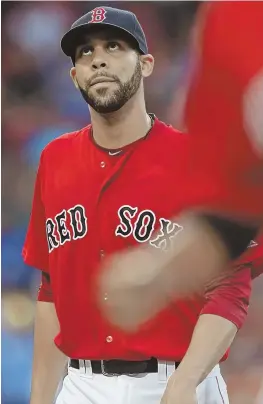  ?? STAFF FILE PHOTO BY JOHN WILCOX ?? TV NESN NESN NESN NESN NESN NESN NESN BABY STEPS: Red Sox left-hander David Price, still recovering from an elbow injury, was cleared to throw a baseball and was able to play catch yesterday in Fort Myers.