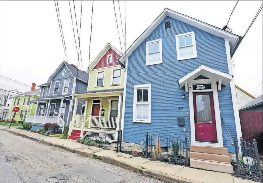  ?? [BARBARA J. PERENIC/DISPATCH PHOTOS] ?? Next weekend’s Home Improvemen­t Tour includes the Italian Village home (the blue one).