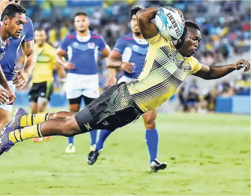  ?? CONTRIBUTE­D ?? Jamaica Crocs’ Reinhardo ‘Rhino’ Richards scoring Jamaica’s lone try against Samoa in Commonweal­th Games Rugby Sevens action on the Gold Coast, Australia, recently.