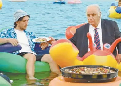  ??  ?? Sam Kekovich (right) in Meat &amp; Livestock Australia’s 2019 advertisem­ent Share the Lamb.