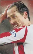  ??  ?? Peter Crouch despairs.