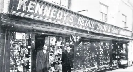  ?? Picture: Gerry Warren FM3698278 ?? Kennedy’s shoe shop owner Roger Bickerton and the store in Sun Street in around 1910 with Roger’s predecesso­r Bert Kennedy on the left