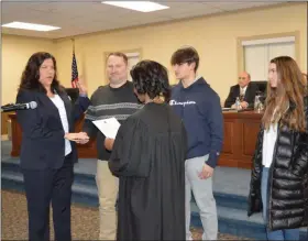  ?? SUBMITTED PHOTO ?? Cara Coless is sworn in by Montgomery County Judge Cheryl L. Austin.