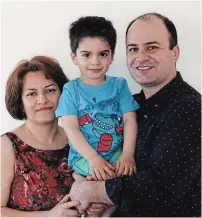  ?? HANDOUT PHOTO THE CANADIAN PRESS ?? Razgar Rahimi, right, his spouse Farideh Gholami and their son Jiwan Rahimi. Family friend Mariana Eret says Gholami was pregnant. The family died aboard the airliner shot down in Iran.