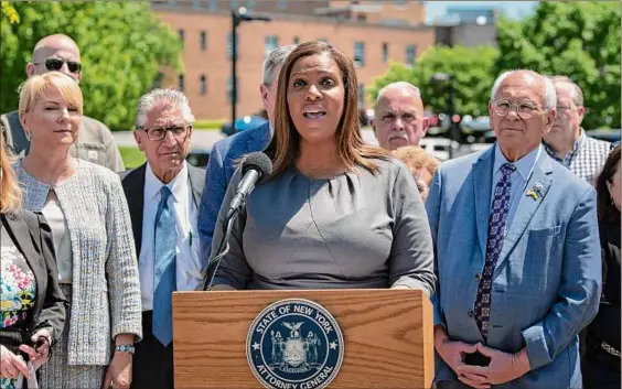  ?? Photos by Paul Buckowski / Times Union ?? New York Attorney General Letitia James speaks at a news conference on Tuesday in Schenectad­y. James announced she is filing a suit against the Roman Catholic Diocese of Albany over the depleted St. Clare’s Hospital pension fund.