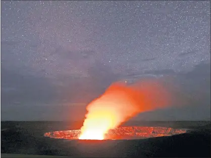  ?? MARIO TAMA — GETTY IMAGES ?? Stars shine above as a plume rises fromthe Halemaumau crater, illuminate­d by glow fromthe crater’s lava lake, within the Kilauea volcano summit at the Hawaii Volcanoes National Park on Wednesday in Hawaii Volcanoes National Park, Hawaii.