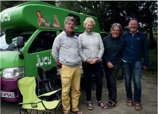  ?? NINA HINDMARSH/STUFF ?? Germans Gerhard Hoelscher, left, Andrea Hoelscher, Maria Rogge and Bernard Rogge are aware of the requiremen­t for travellers entering New Zealand to self-isolate for 14 days, ‘‘but we have no fear’’.