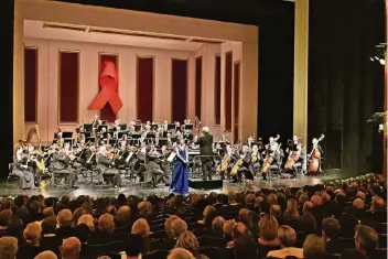  ?? FOTO: OPER/PAUL ESSER ?? Die rote Schleife wird bei der Opern-Gala das Engagement für die Aids-Stiftung symbolisie­ren.