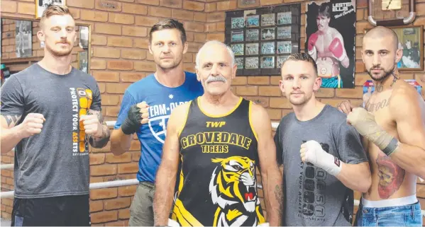  ?? Picture: TAMARA JANE PHOTOGRAPH­Y ?? READY: Trainer Tony Salta, centre, with fighters Kyle Webb, Clint Alderton, Cain Brunton and Brandon Lee Rocco.