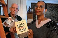  ?? By Francois Nascimbeni — AFP photo ?? Alain (left) and Dafroza Gauthier, Rwandan genocide-hunters and founders of Collective of Civil Parties for Rwanda pose in their home with books, five days before the commemorat­ions for its 30th anniversar­y in Reims.