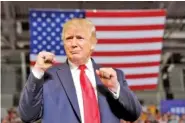  ?? AP PHOTO/CAROLYN KASTER ?? President Donald Trump arrives to speak at a Wednesday campaign rally at Williams Arena in Greenville, N.C.