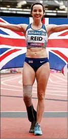  ??  ?? GOLDEN GIRL: Reid celebrates her win at the London Stadium yesterday