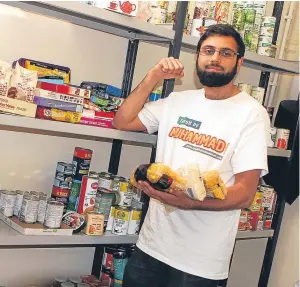  ??  ?? Rizwan Rafik in the foodbank at the Taught by Mohammed centre.