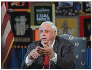  ?? (Charleston Gazette-Mail/F. Brian Ferguson) ?? West Virginia Gov. Jim Justice holds a news conference last month at the state Capitol in Charleston. Justice’s coal companies have agreed to pay millions for mine safety violations.