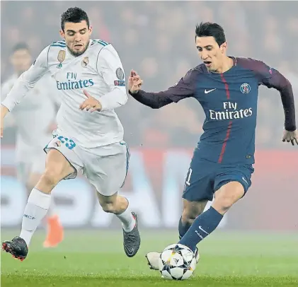  ?? REUTERS ?? Desangelad­o. Di María, aquí marcado por Kovacic, no pudo hacer olvidar al lesionado Neymar.