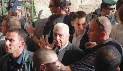  ??  ?? ARIEL SHARON visits the Temple Mount in 2000.