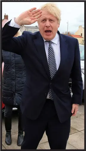  ?? Pictures: REUTERS; REX/SHUTTERSTO­CK ?? SALUTE: Boris owes last week’s success in Hartlepool to Nigel Farage