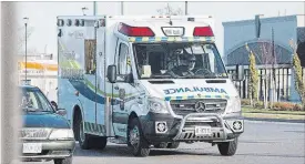  ?? BOB TYMCZYSZYN THE ST. CATHARINES STANDARD ?? A Niagara EMS ambulance is pictured in the west end ofSt. Catharines in this file photo.