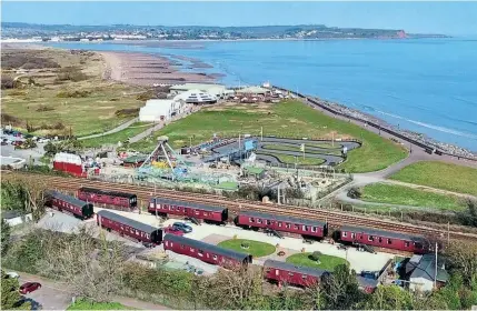  ?? ?? An aerial view of the site, with all eight coaches visible and highlighti­ng its close proximity to the seafront. BETTESWORT­HS