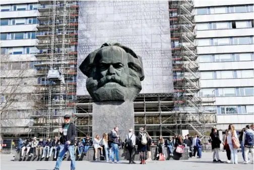  ?? The landmark of Chemnitz, the Karlmarx-monument built in 1971 by the former East German government to honour the writer of the Communist Manifesto is pictured in Chemnitz, Germany, on March 2024 ,18. Reuters ??