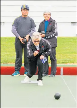  ?? Photo / Dean Taylor ?? Te Awamutu Bowling Club president Diane Sharpe rolls up for a Bowls3Five practice, watched by Judy Cato and Chen Naude.