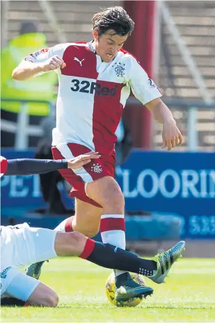  ??  ?? halt the progress of Joey Barton at Dens Park yesterday