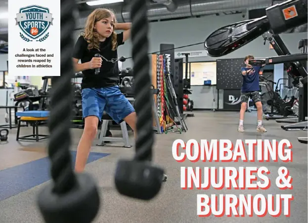  ?? ?? MAIN: Middle schooler Owen Carothers, 12, does a single arm row at the AHN Sports Complex at Cool Springs in Bethel Park.