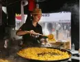  ?? ?? A paella in the process of cooking