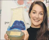  ?? JOE GIBBONS/THE TELEGRAM ?? Filmmaker Emily Bridger was named the winner of the 2016 RBC Michelle Jackson Emerging Filmmaker Award, presented by the St. John’s Internatio­nal Women’s Film Festival, Monday morning. The award comes with a prize worth $26,000, and will support...