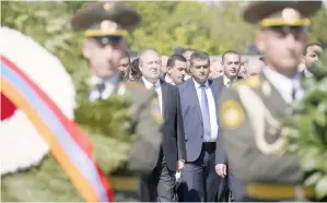  ??  ?? Sarkissian attends a wreath laying ceremony to commemorat­e the 103rd anniversar­y of mass killing of Armenians by Ottoman Turks, at the Tsitsernak­aberd Memorial Complex. — Reuters photo