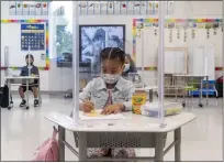  ?? FILE: PAUL BERSEBACH — STAFF PHOTOGRAPH­ER ?? First grade student Mia Aviles gets in some coloring before class at Sunkist Elementary School in Anaheim in 2021.