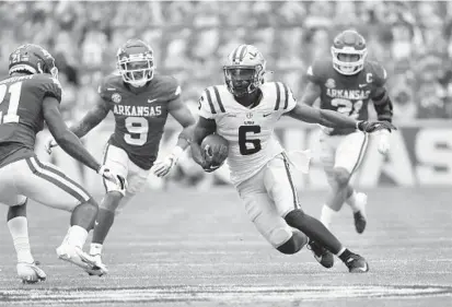  ?? MICHAEL WOODS/AP ?? LSU wide receiver Terrace Marshall Jr. cuts against Arkansas in November.