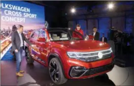  ?? MARK LENNIHAN — THE ASSOCIATED PRESS ?? A five-passenger SUV concept is unveiled by Volkswagen at the New York Auto Show, Tuesday. The vehicle will be designed and engineered for the American market and Volkswagen will construct it at its plant in Chattanoog­a, Tenn.