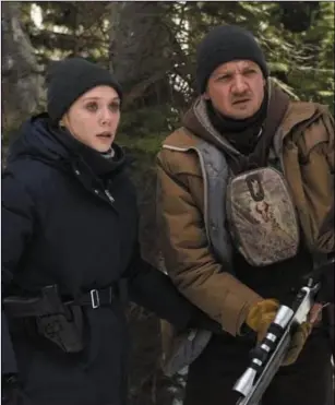  ?? Wind River. ?? Elizabeth Olsen and Jeremy Renner in