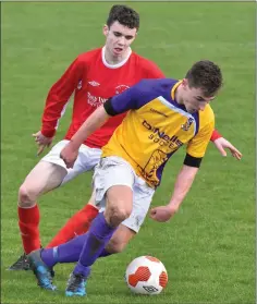  ??  ?? Wexford’s Kyle Firman is tracked by Nathan Broderick of Cork.