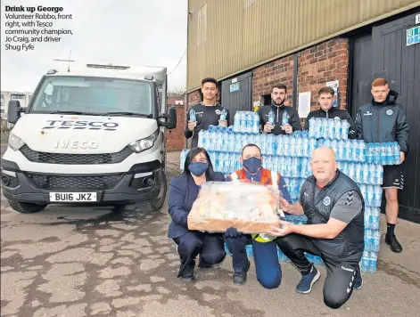  ?? ?? Drink up George Volunteer Robbo, front right, with Tesco community champion, Jo Craig, and driver Shug Fyfe