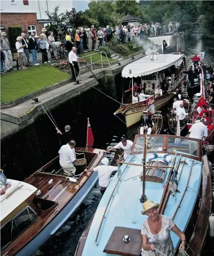  ?? THE VINTNERS COMPANY ?? Getting the boats ready for the annual swan count on the Thames, which helps educate people about the river.